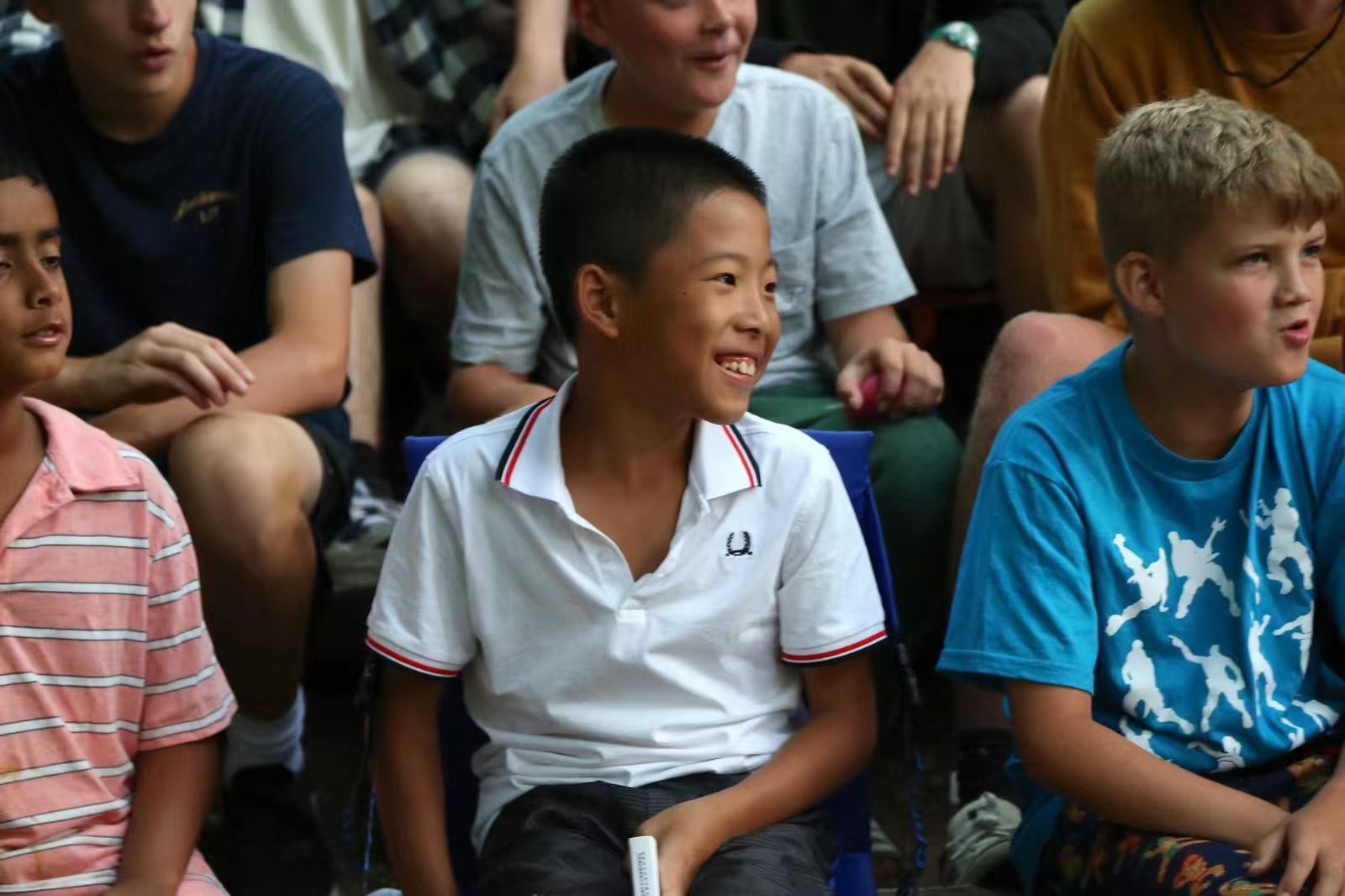 Smiling among campers at a summer camp in the United States