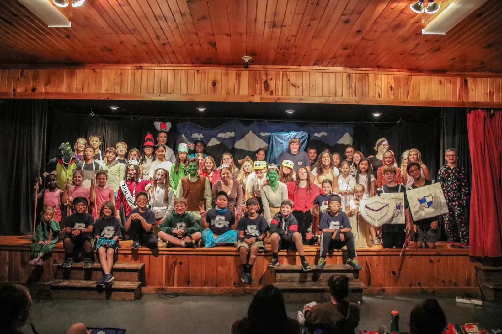 The whole camp on stage after the final performance
