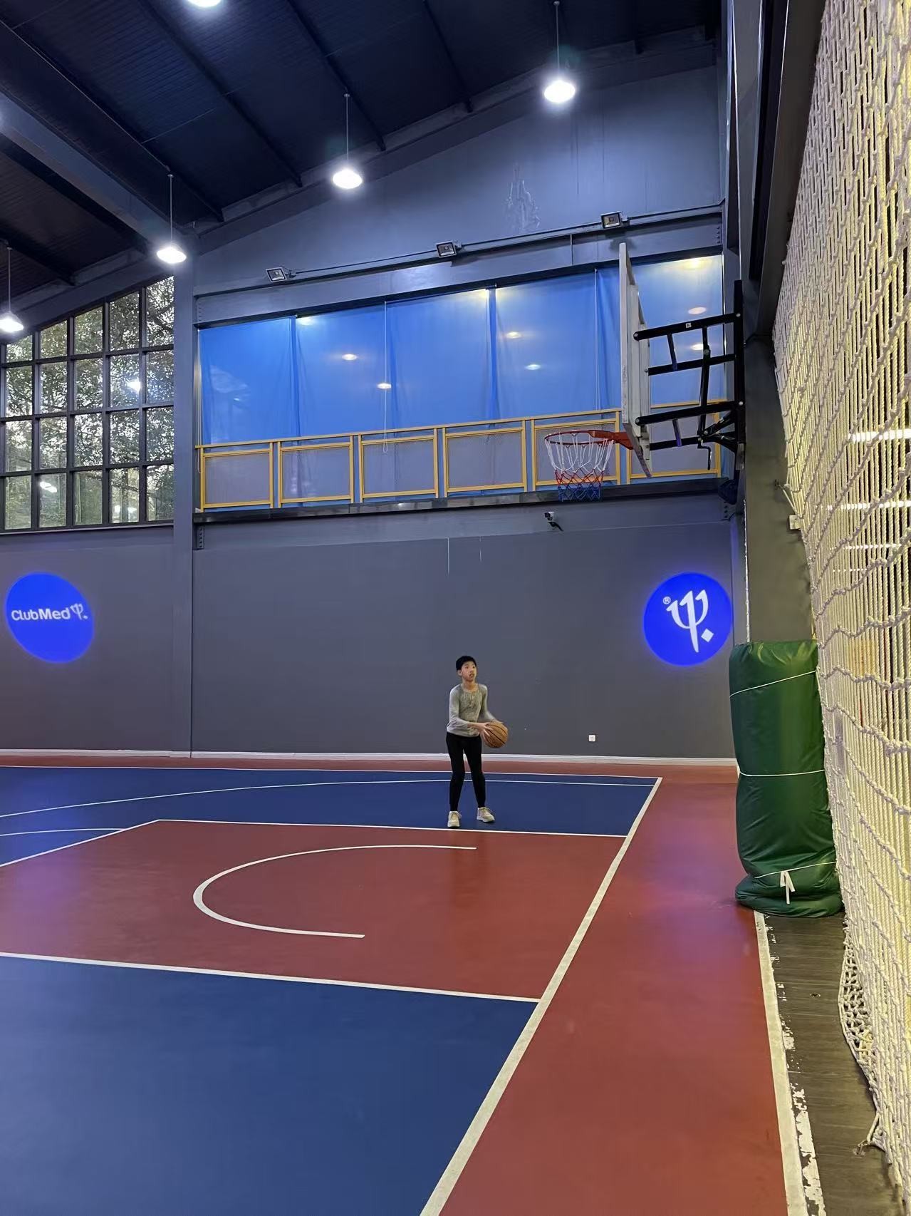 Dribbling on an indoor basketball court