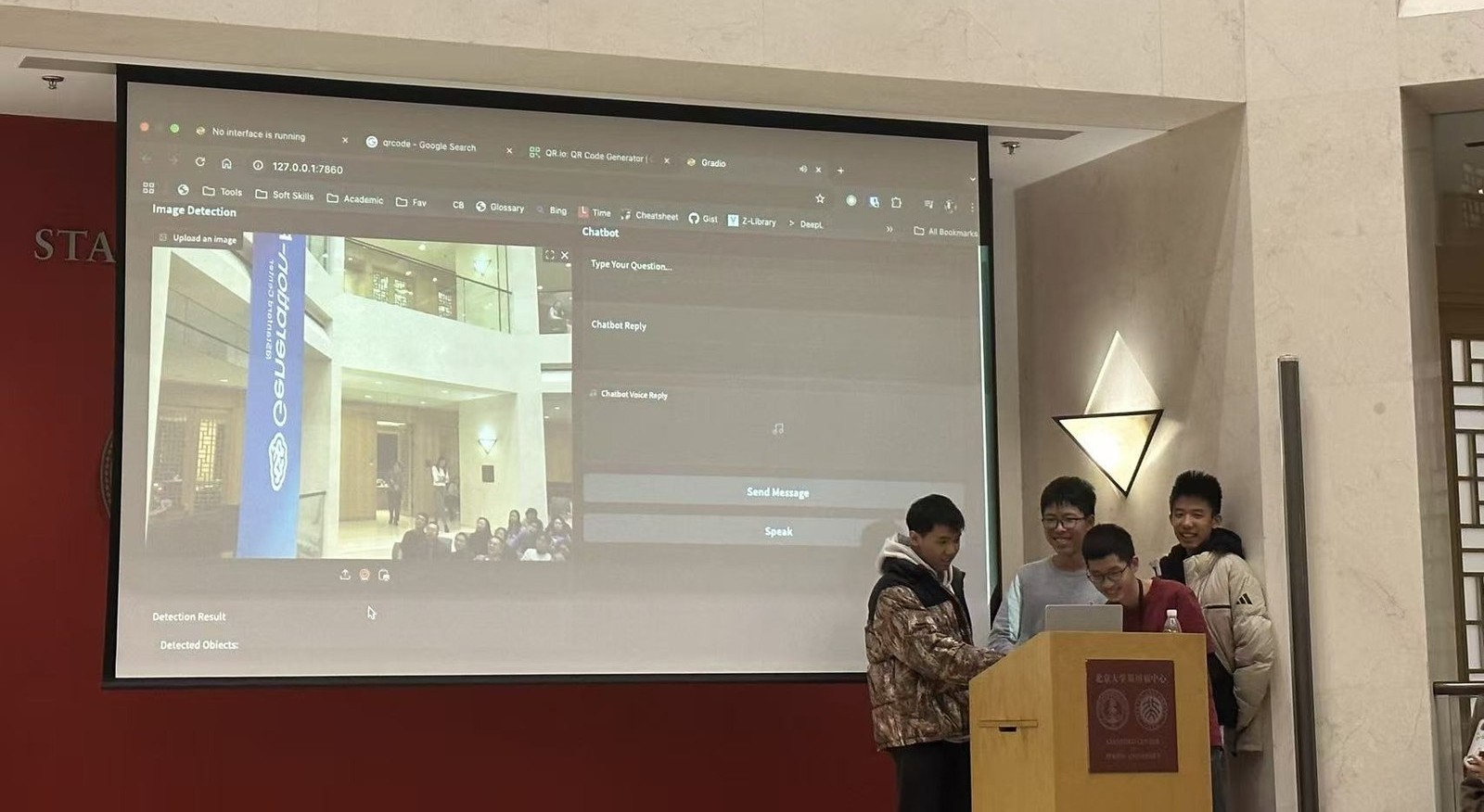 Presenting our Gradio chatbot demo on stage at Generation-AI @ SCPKU